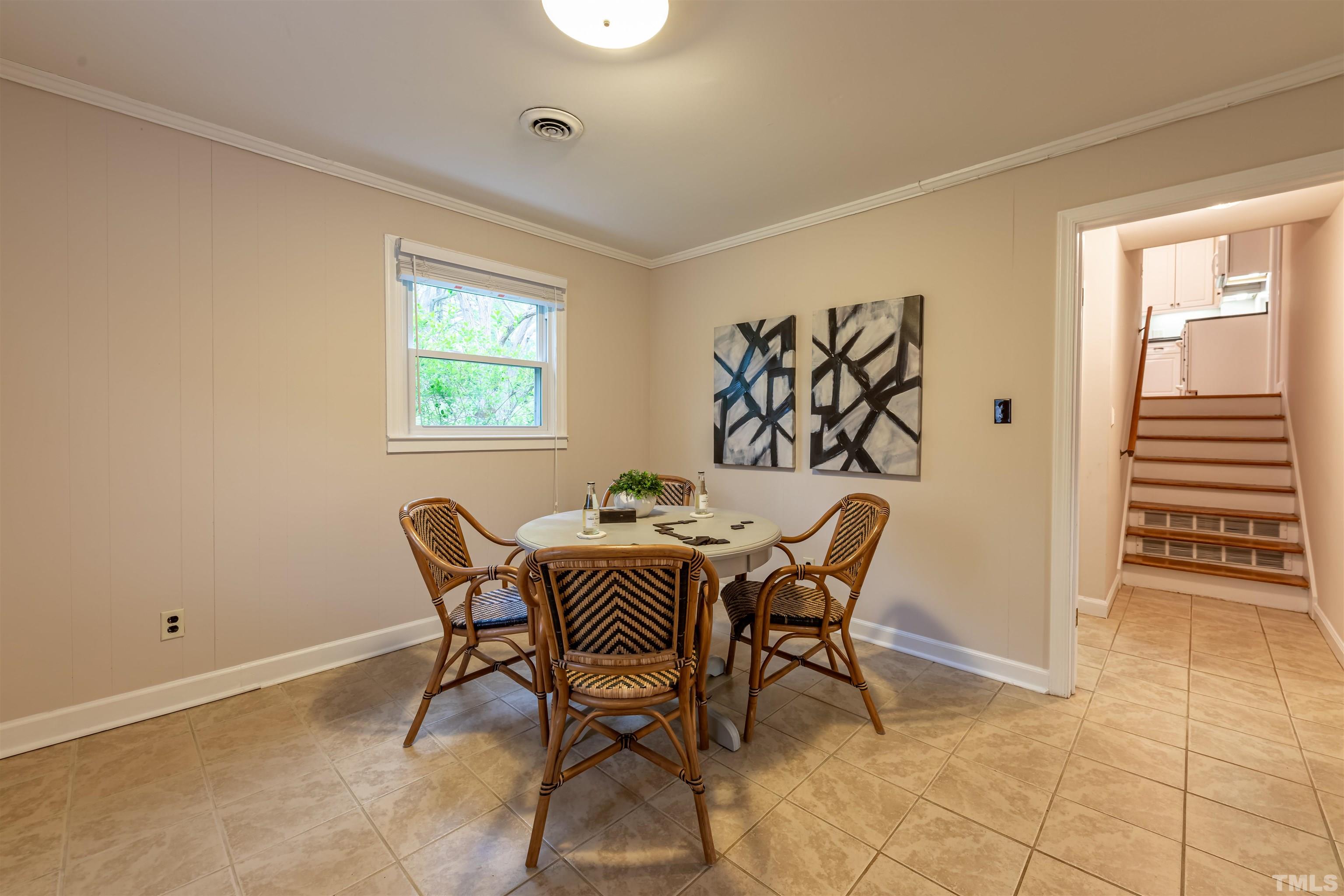 3101 Sherry Drive Raleigh, NC 27604 - Photo 22 of 28 a dining room with furniture and window