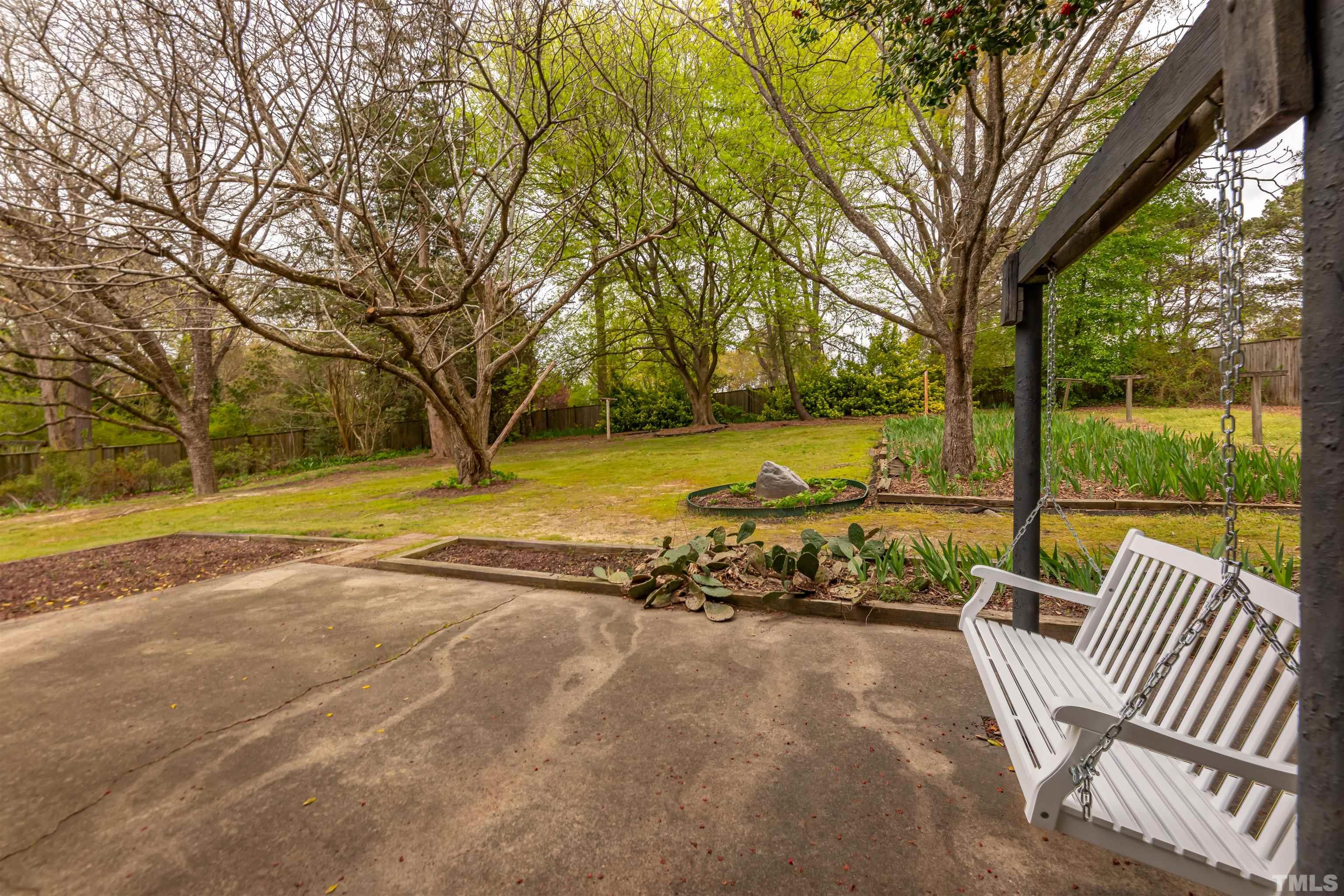 3101 Sherry Drive Raleigh, NC 27604 - Photo 6 of 28 a view of a swimming pool with a patio and a yard
