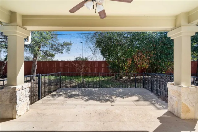 a view of a back yard of the house