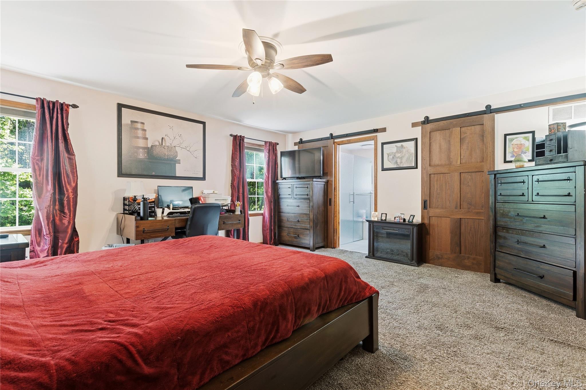 239-241 Fosler Road Highland, NY 12528 - Photo 8 of 42 Spacious room featuring neutral carpeting and a ceiling fan