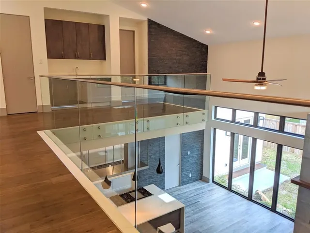 a bathroom with a sink a mirror and shower