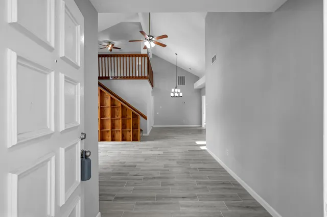 a view of entryway with a front door