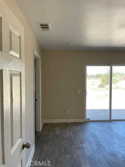 10645 East Ave R 12 Littlerock, CA 93543 - Photo 14 of 23 a view of an empty room and window