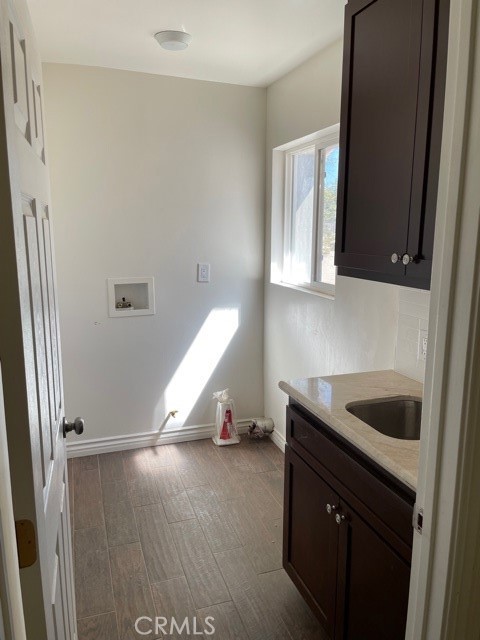 10645 East Ave R 12 Littlerock, CA 93543 - Photo 19 of 23 a kitchen with a sink and a window