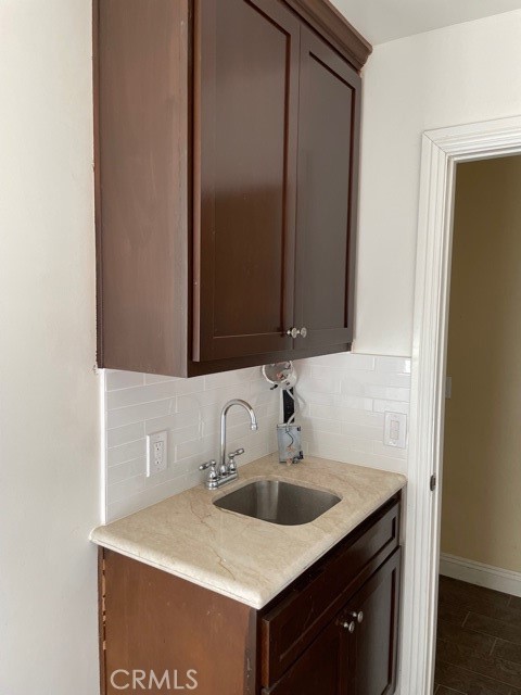 10645 East Ave R 12 Littlerock, CA 93543 - Photo 20 of 23 a bathroom with a sink and a mirror