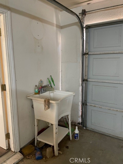 10645 East Ave R 12 Littlerock, CA 93543 - Photo 23 of 23 a view of a room that has a table and chairs in it