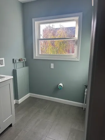 a room with a window and gate