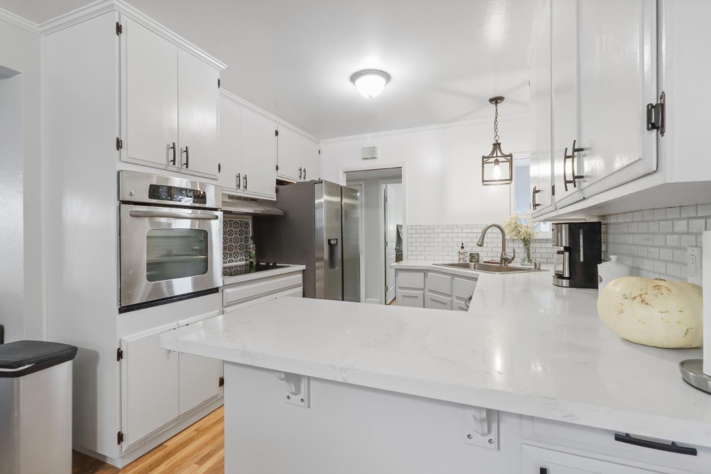 3784 Timberline Drive San Jose, CA 95121 - Photo 2 of 17 a kitchen with stainless steel appliances a refrigerator and a stove