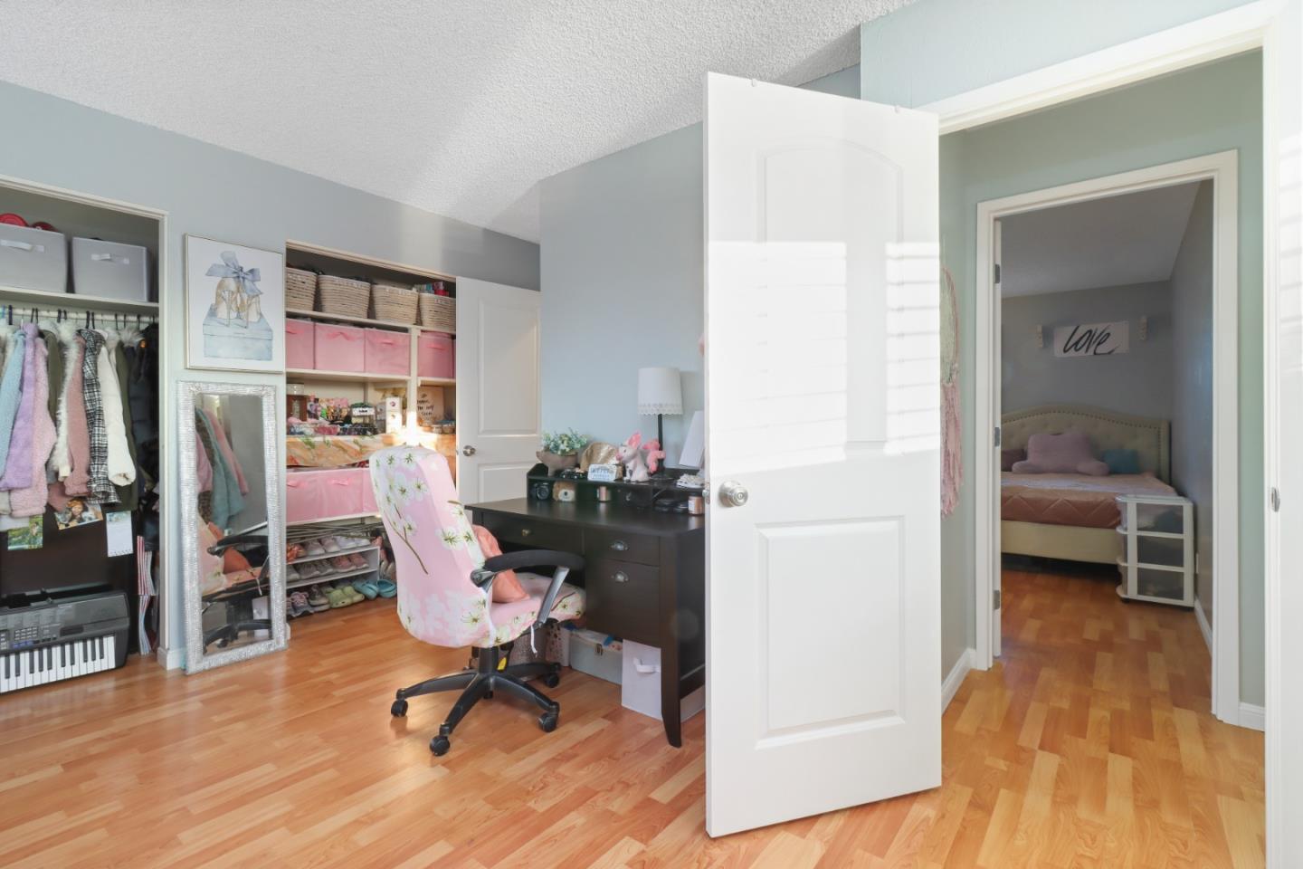 3784 Timberline Drive San Jose, CA 95121 - Photo 13 of 17 a view of a workspace with furniture and a livingroom