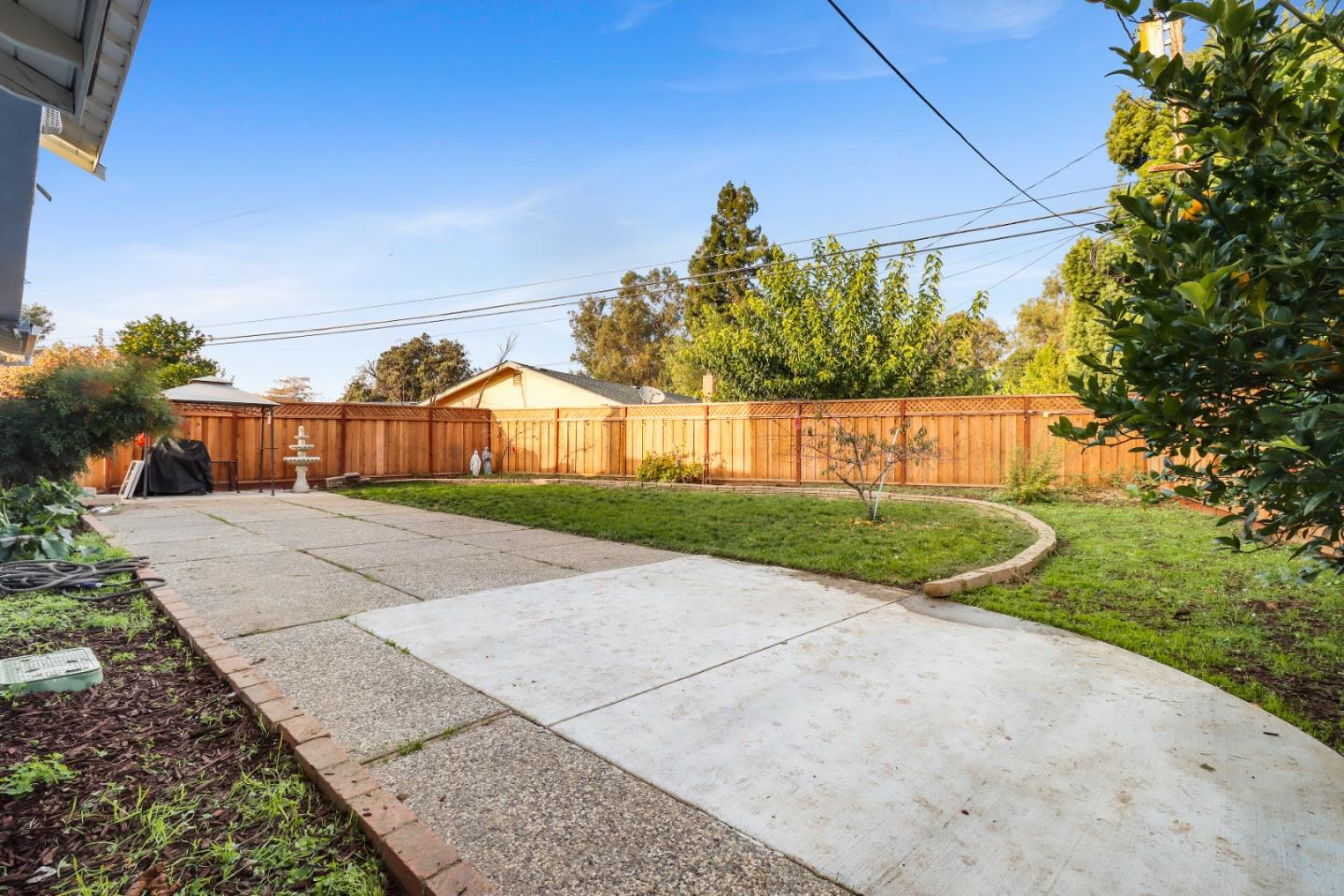 3784 Timberline Drive San Jose, CA 95121 - Photo 17 of 17 a front view of a house with a yard and garage