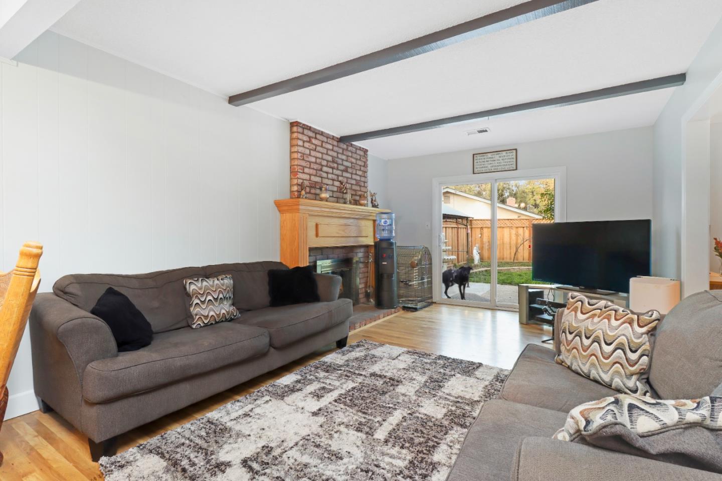 3784 Timberline Drive San Jose, CA 95121 - Photo 6 of 17 a living room with furniture and a flat screen tv