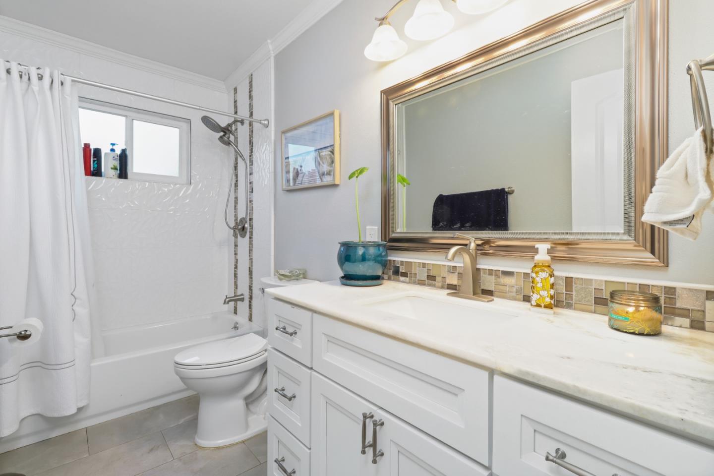 3784 Timberline Drive San Jose, CA 95121 - Photo 9 of 17 a bathroom with a sink a toilet and shower