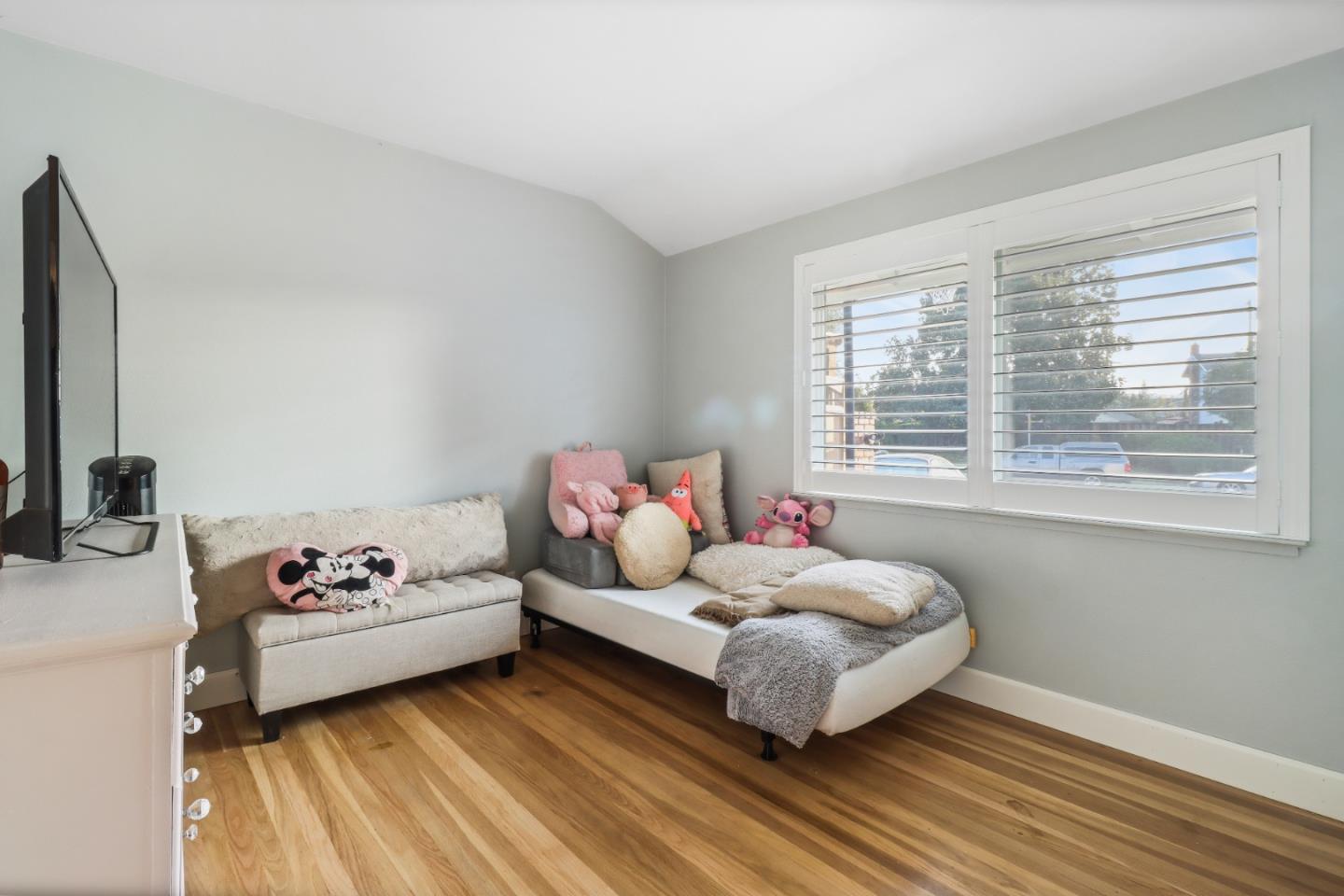 3784 Timberline Drive San Jose, CA 95121 - Photo 10 of 17 a bedroom with a bed and a couch