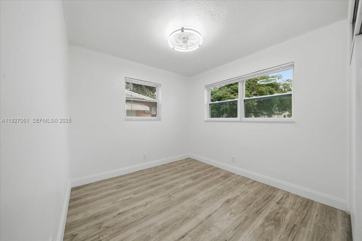 3330 North 72nd Terrace Hollywood, FL 33024 - Photo 14 of 32 an empty room with a window