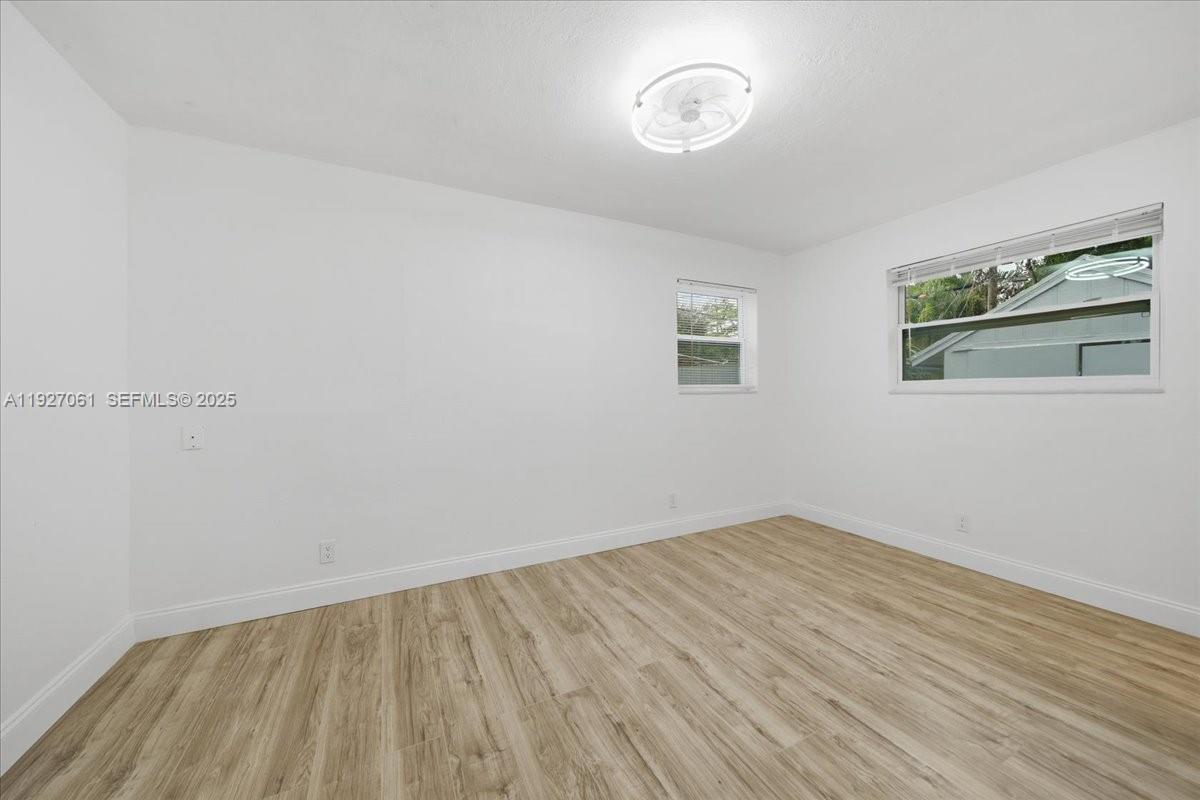 3330 North 72nd Terrace Hollywood, FL 33024 - Photo 16 of 32 an empty room with a window