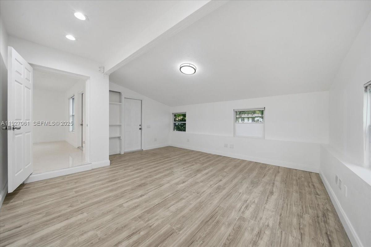 3330 North 72nd Terrace Hollywood, FL 33024 - Photo 22 of 32 a view of empty room with wooden floor