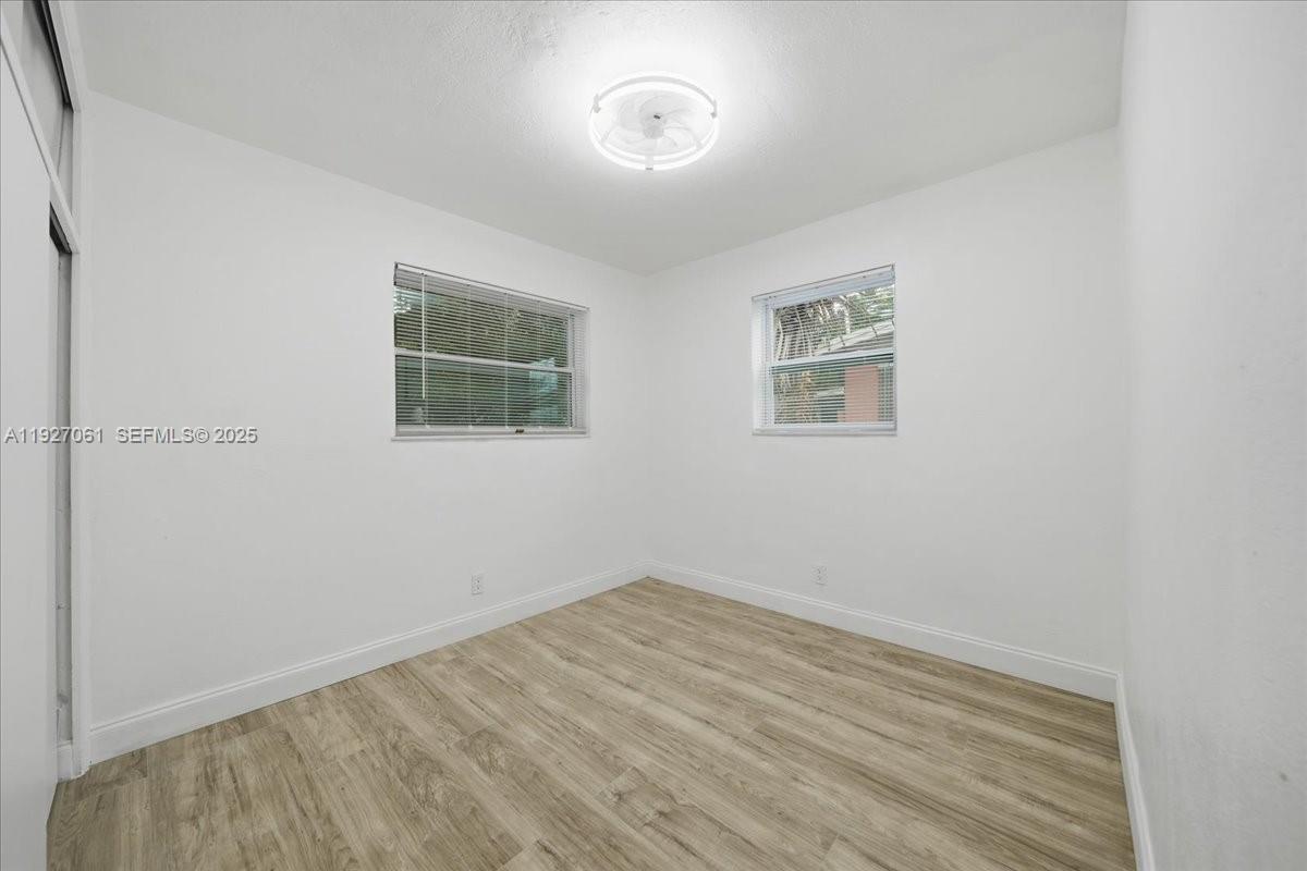 3330 North 72nd Terrace Hollywood, FL 33024 - Photo 24 of 32 an empty room with a window