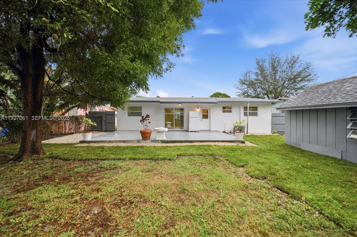 3330 North 72nd Terrace Hollywood, FL 33024 - Photo 4 of 32 a view of a house with a backyard