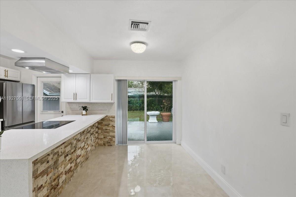 3330 North 72nd Terrace Hollywood, FL 33024 - Photo 8 of 32 a very nice looking room with a large window