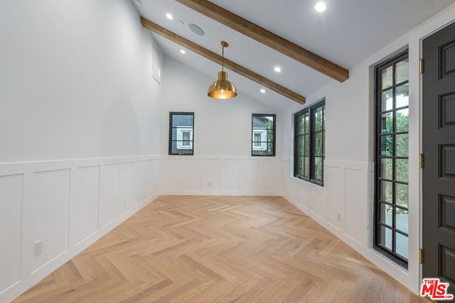 a view of an empty room and window