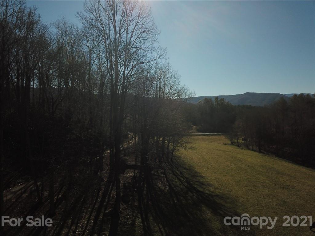 326 Indian Springs Road Clyde, NC 28721 - Photo 14 of 19 a view of swimming pool and mountain view in back