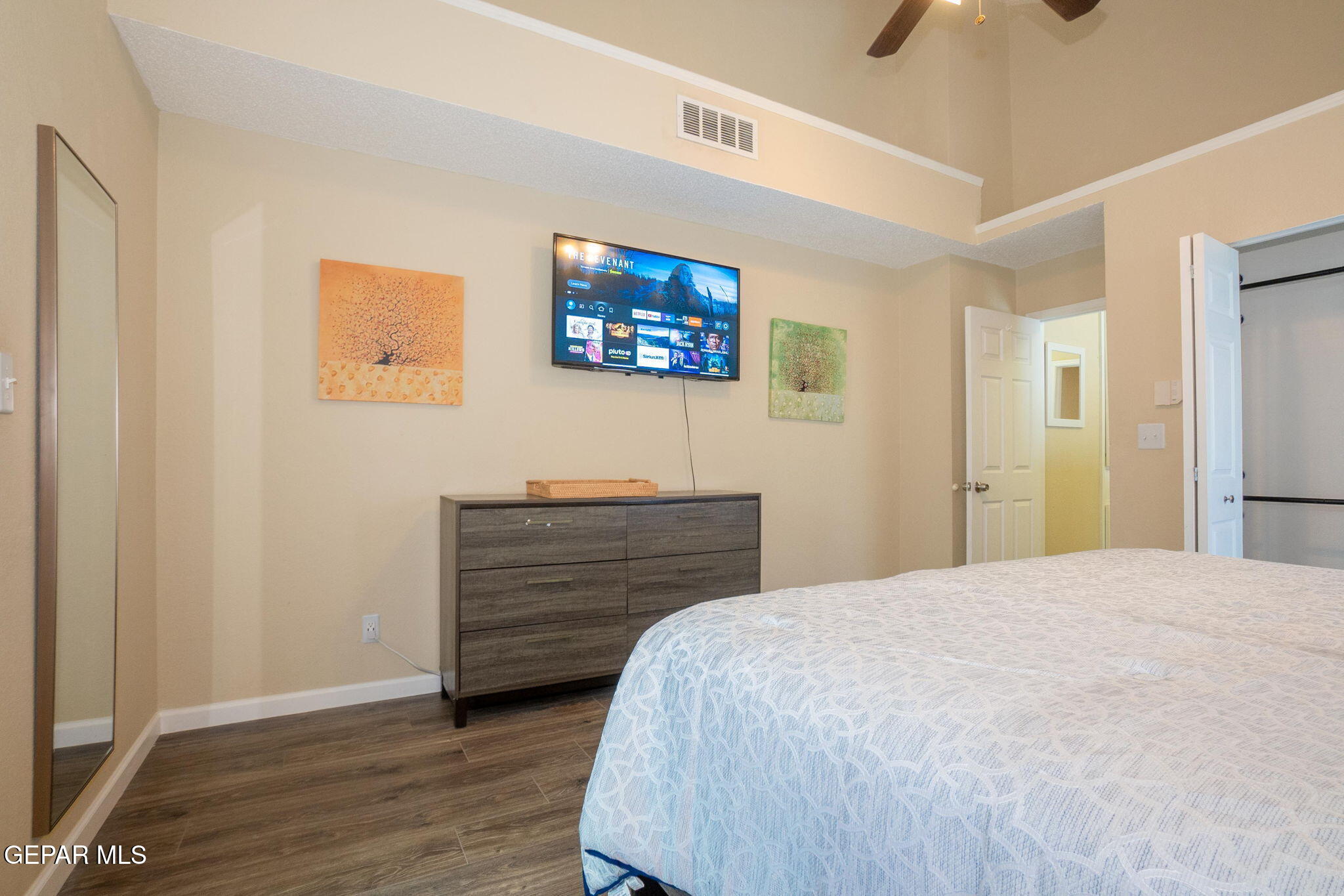 2012 Rogelio Avenue El Paso, TX 79902 - Photo 11 of 12 a bedroom with a bed and a dresser