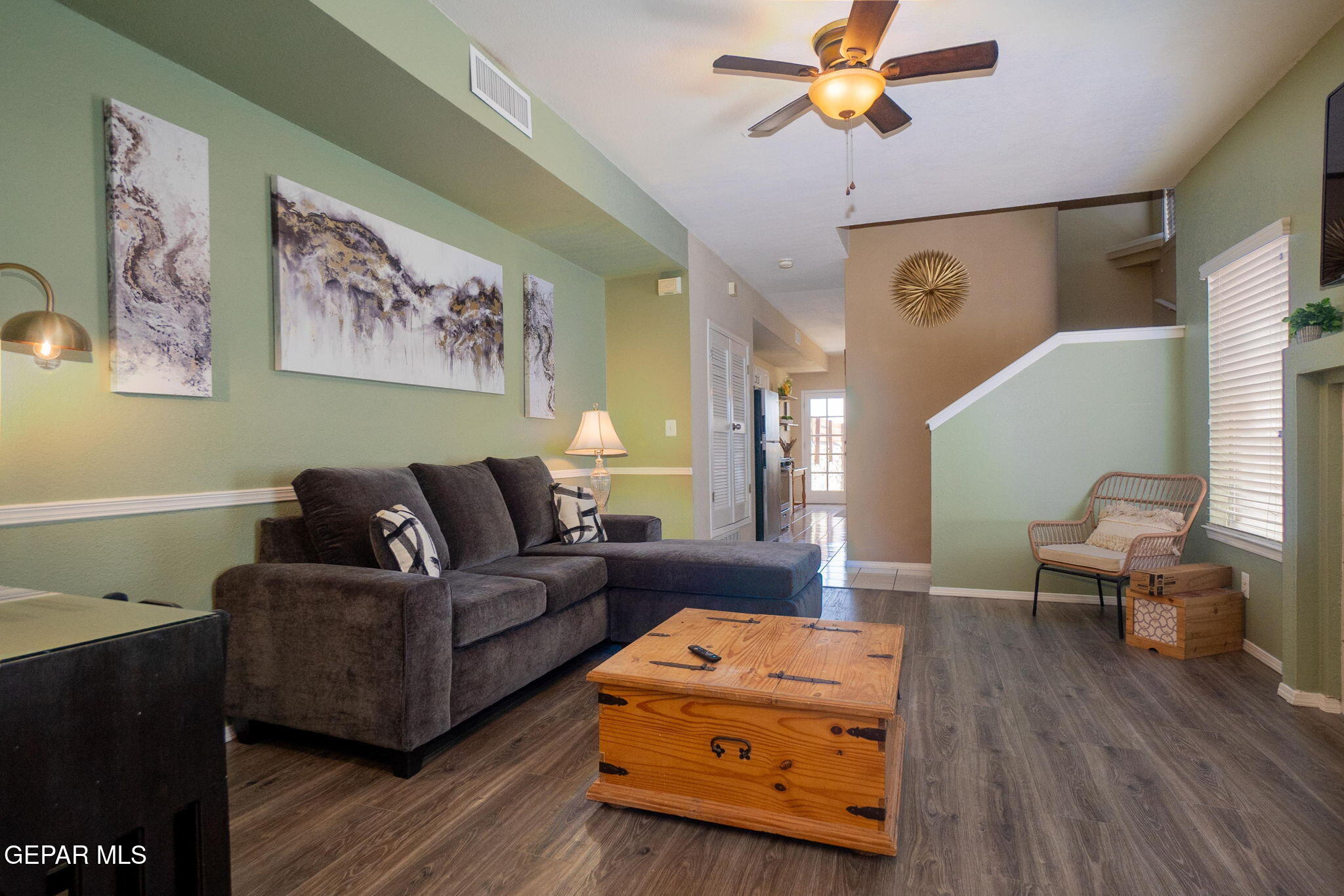 2012 Rogelio Avenue El Paso, TX 79902 - Photo 4 of 12 a living room with furniture and a wooden floor