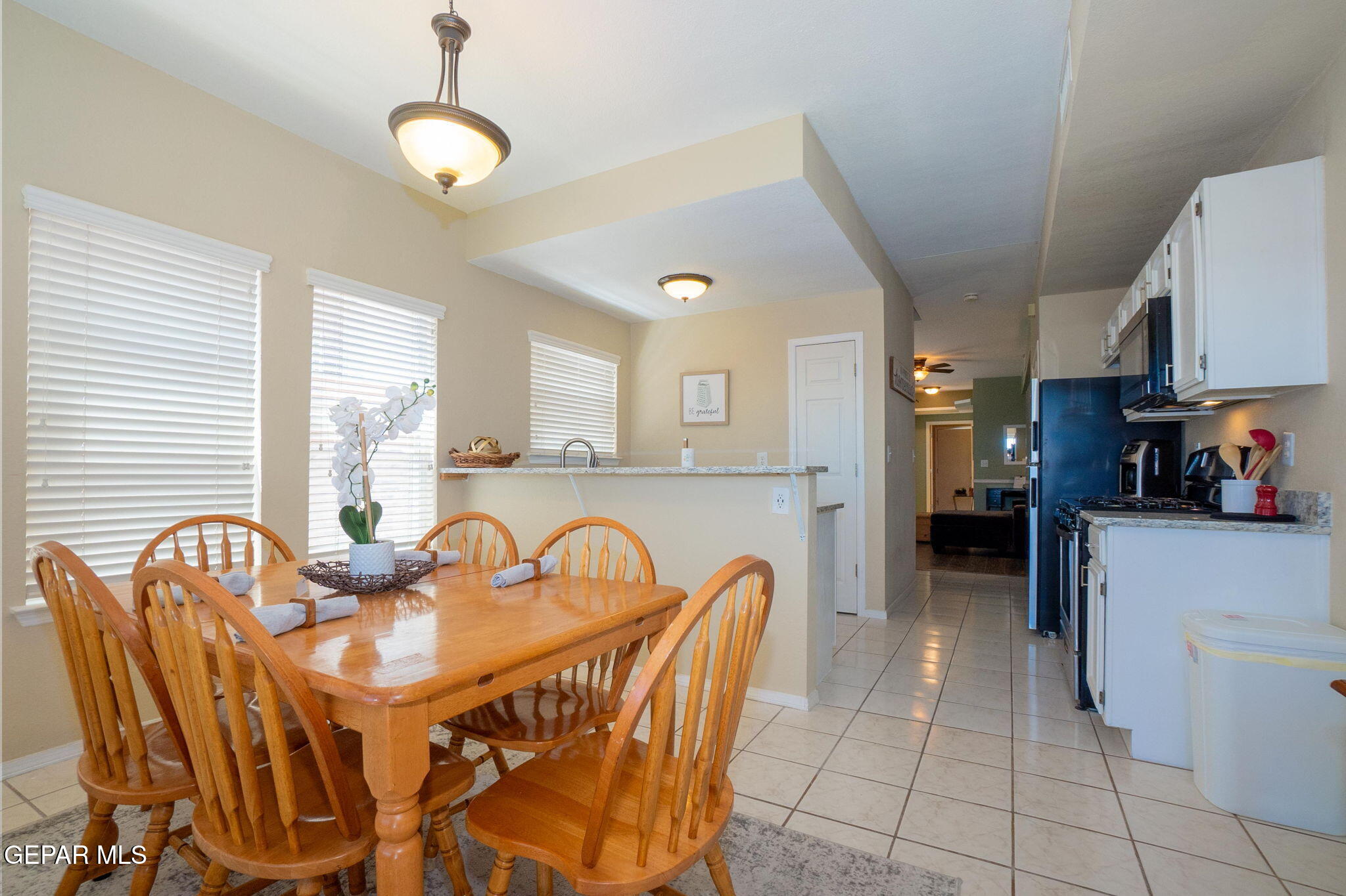 2012 Rogelio Avenue El Paso, TX 79902 - Photo 9 of 12 a dining room with furniture and window