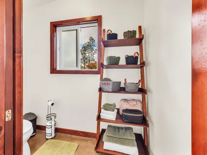 a living room with furniture and next to a window
