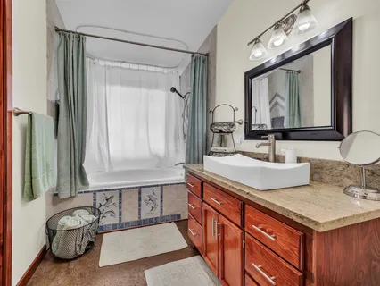 a bathroom with a sink double vanity and a mirror