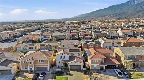 a kitchen with stainless steel appliances kitchen island granite countertop a sink and cabinets