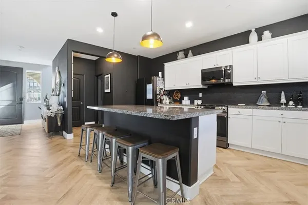 a view of balcony with wooden floor