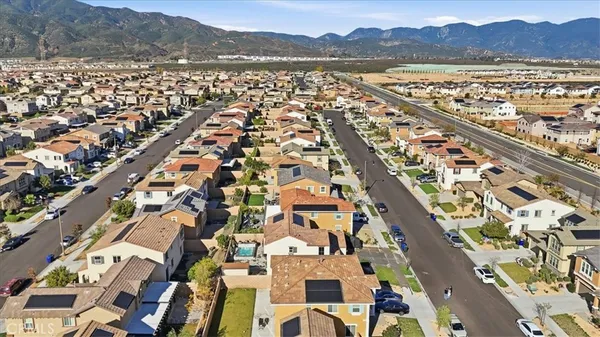 an aerial view of residential building and trees