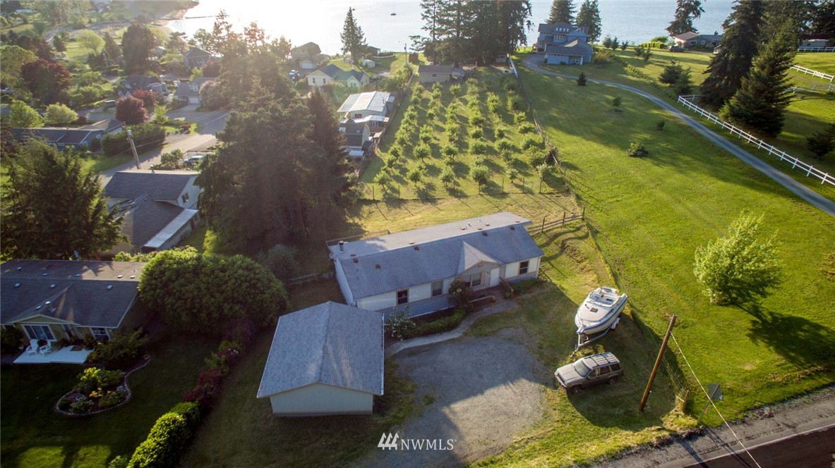5390 East Harbor Road Freeland, WA 98249 - Photo 2 of 17 an aerial view of a residential houses with outdoor space