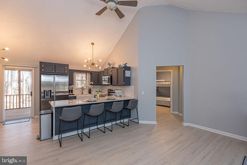 47 Falcon Bridge Road Ocean Pines, MD 21811 - Photo 14 of 78 a view of a dining room with furniture and window