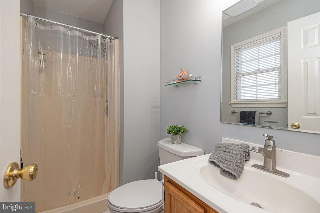 47 Falcon Bridge Road Ocean Pines, MD 21811 - Photo 20 of 78 a bathroom with a sink toilet and shower