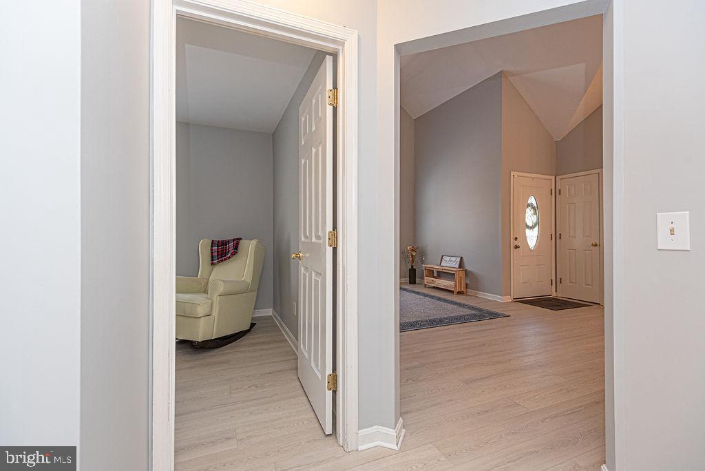 47 Falcon Bridge Road Ocean Pines, MD 21811 - Photo 28 of 78 a view of a livingroom and a livingroom with furniture
