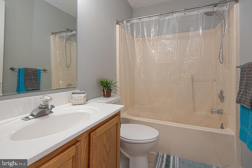 47 Falcon Bridge Road Ocean Pines, MD 21811 - Photo 32 of 78 a bathroom with a sink a toilet and shower