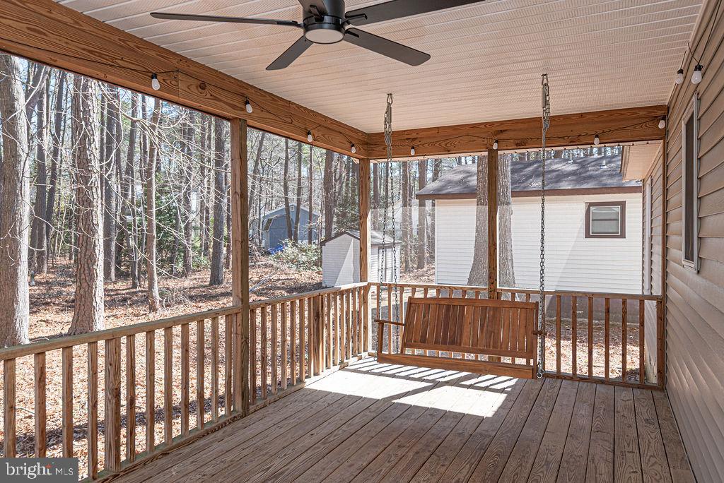 47 Falcon Bridge Road Ocean Pines, MD 21811 - Photo 35 of 78 a view of a balcony with wooden floor