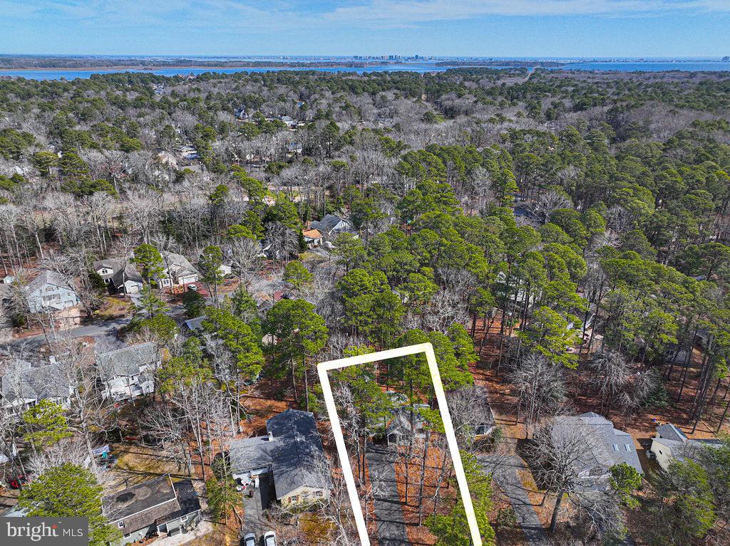47 Falcon Bridge Road Ocean Pines, MD 21811 - Photo 46 of 78 an aerial view of a house with a yard
