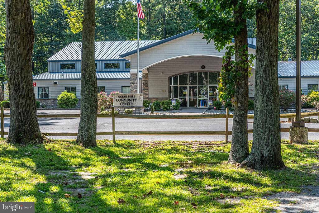 47 Falcon Bridge Road Ocean Pines, MD 21811 - Photo 57 of 78 a front view of a house with a yard