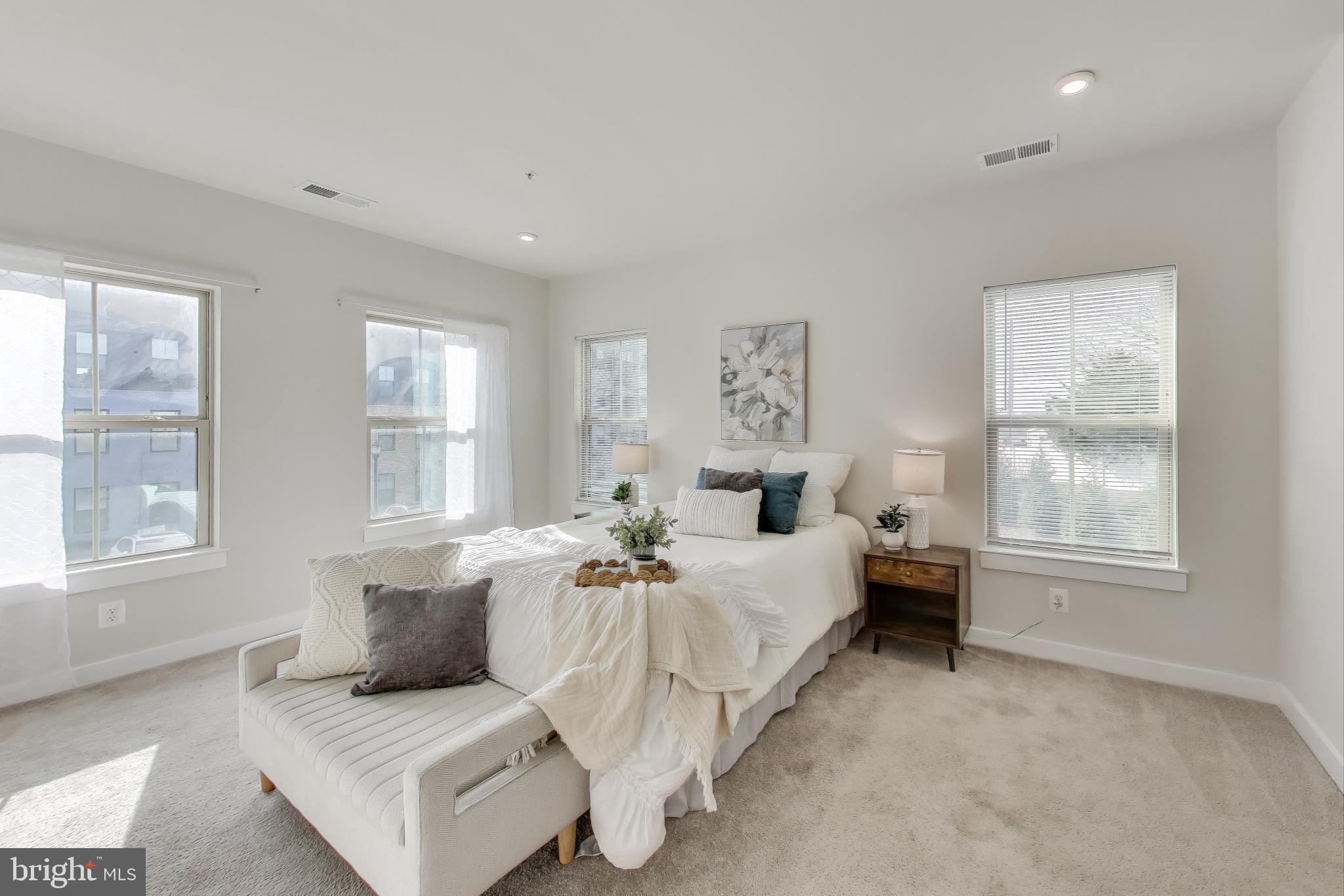 10020 Ruffian Way, Unit E Laurel, MD 20723 - Photo 11 of 30 a living room with furniture and windows
