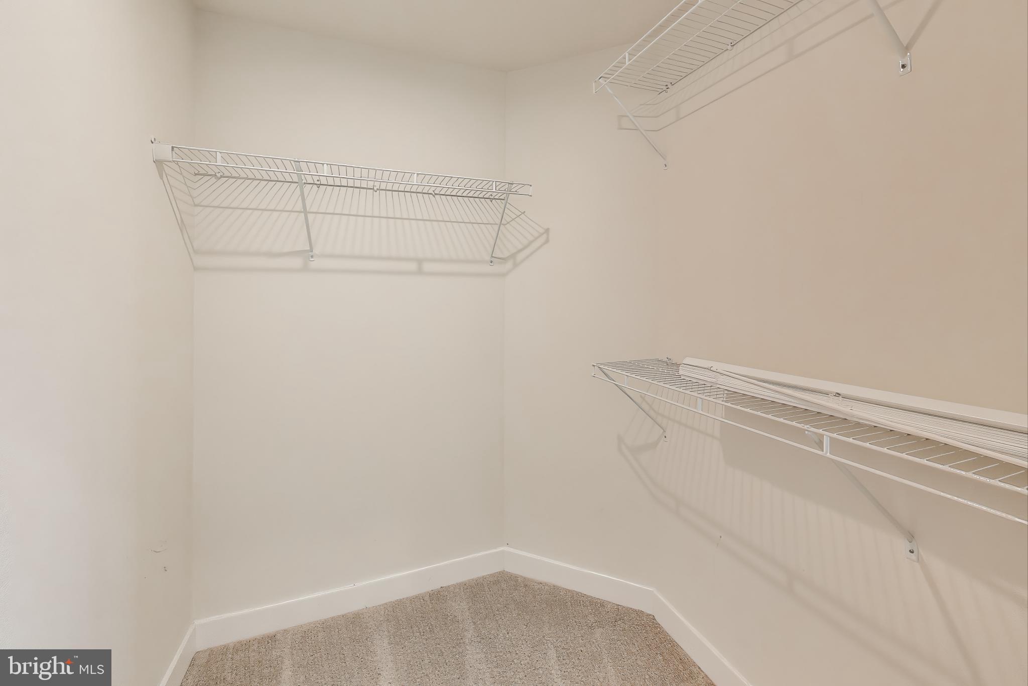 10020 Ruffian Way, Unit E Laurel, MD 20723 - Photo 16 of 30 a view of a room with racks on the wall