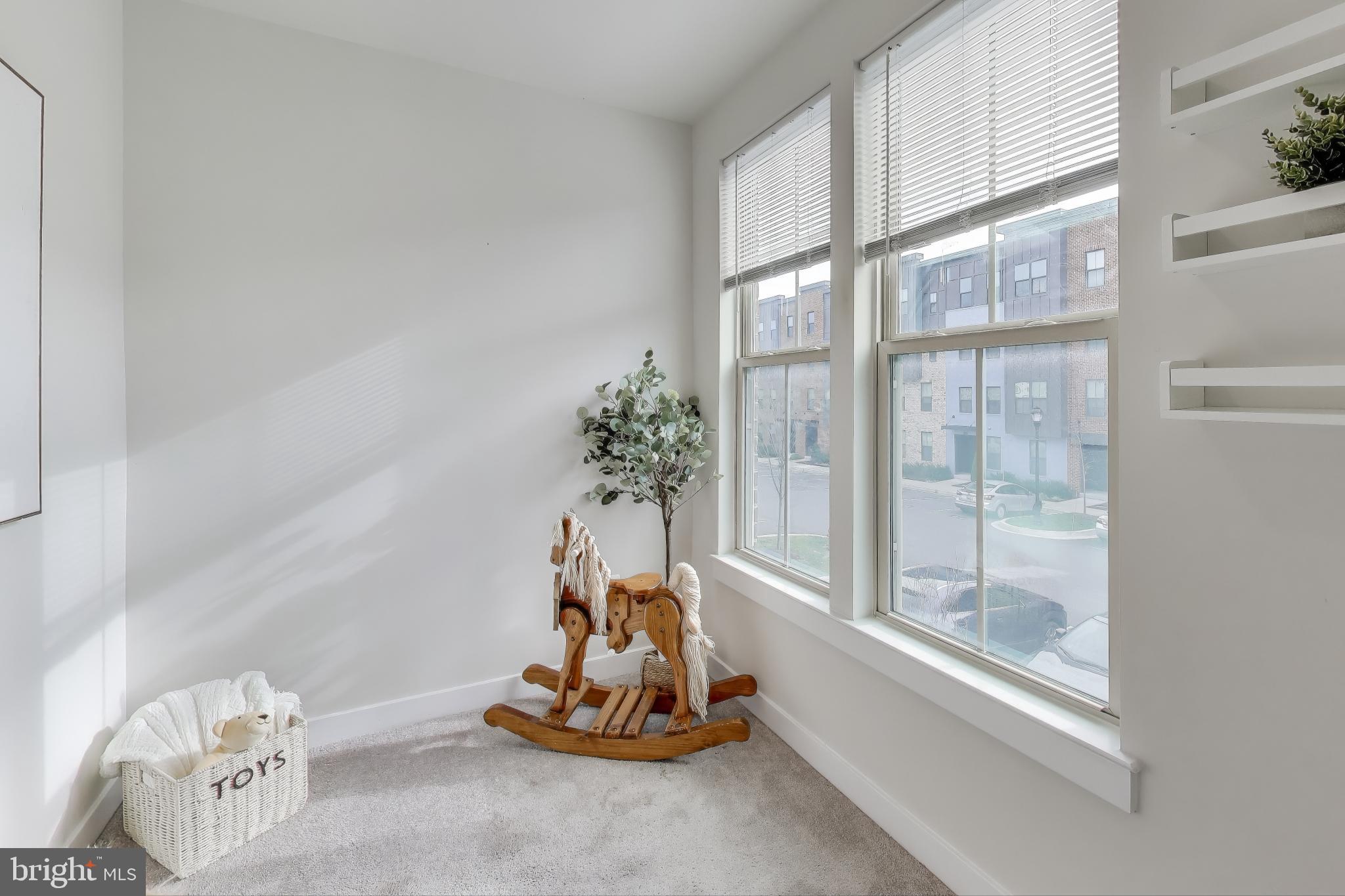 10020 Ruffian Way, Unit E Laurel, MD 20723 - Photo 20 of 30 a view of a small room with a floor to ceiling window and floor to ceiling window