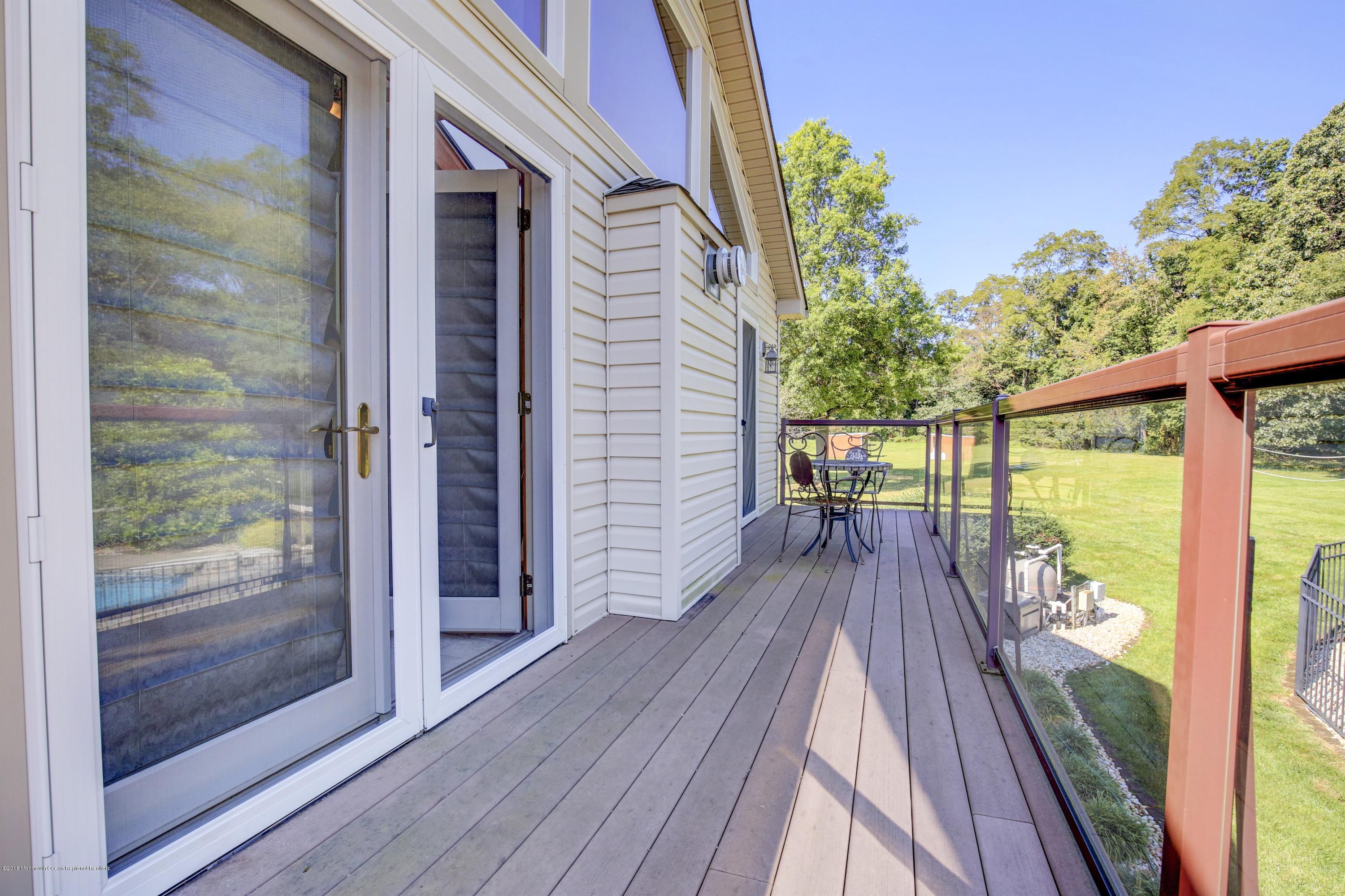 115 Wellington Road Freehold, NJ 07728 - Photo 22 of 40 022_Master Bedroom Balcony