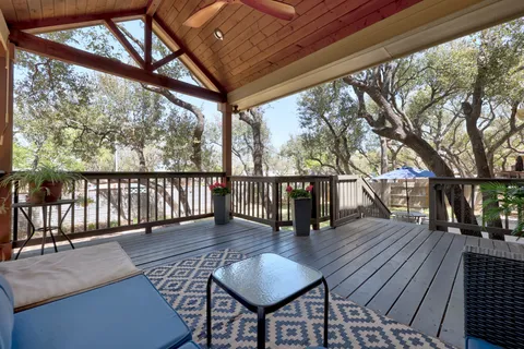 a view of a chairs and table on the wooden floor