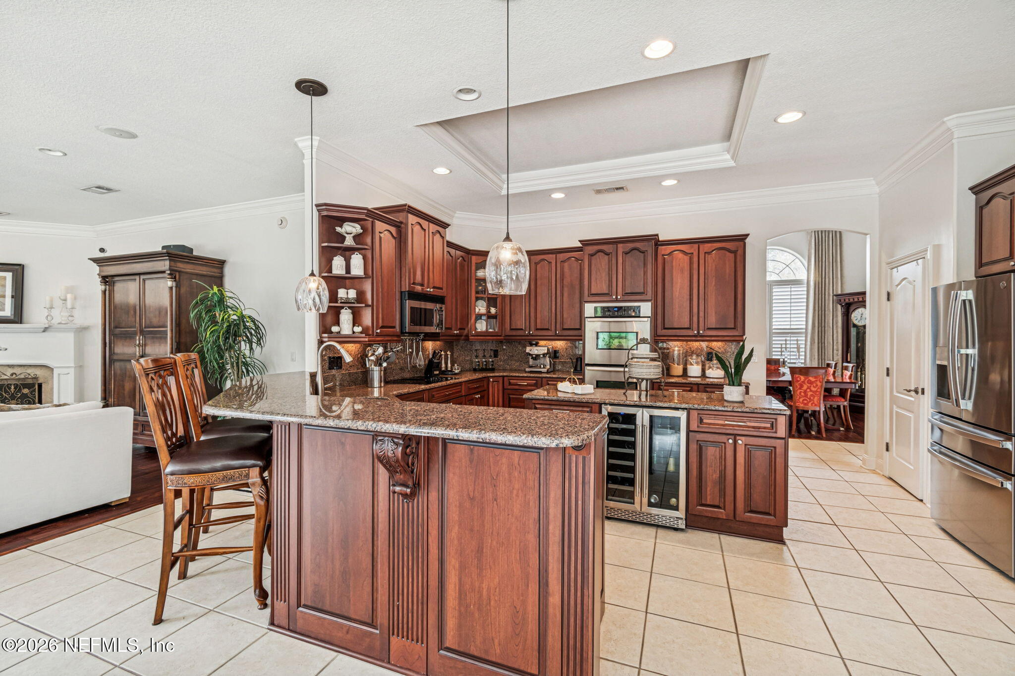 113 Natures Way Ponte Vedra Beach, FL 32082 - Photo 43 of 96 a kitchen with kitchen island granite countertop lots of counter top space and stainless steel appliances