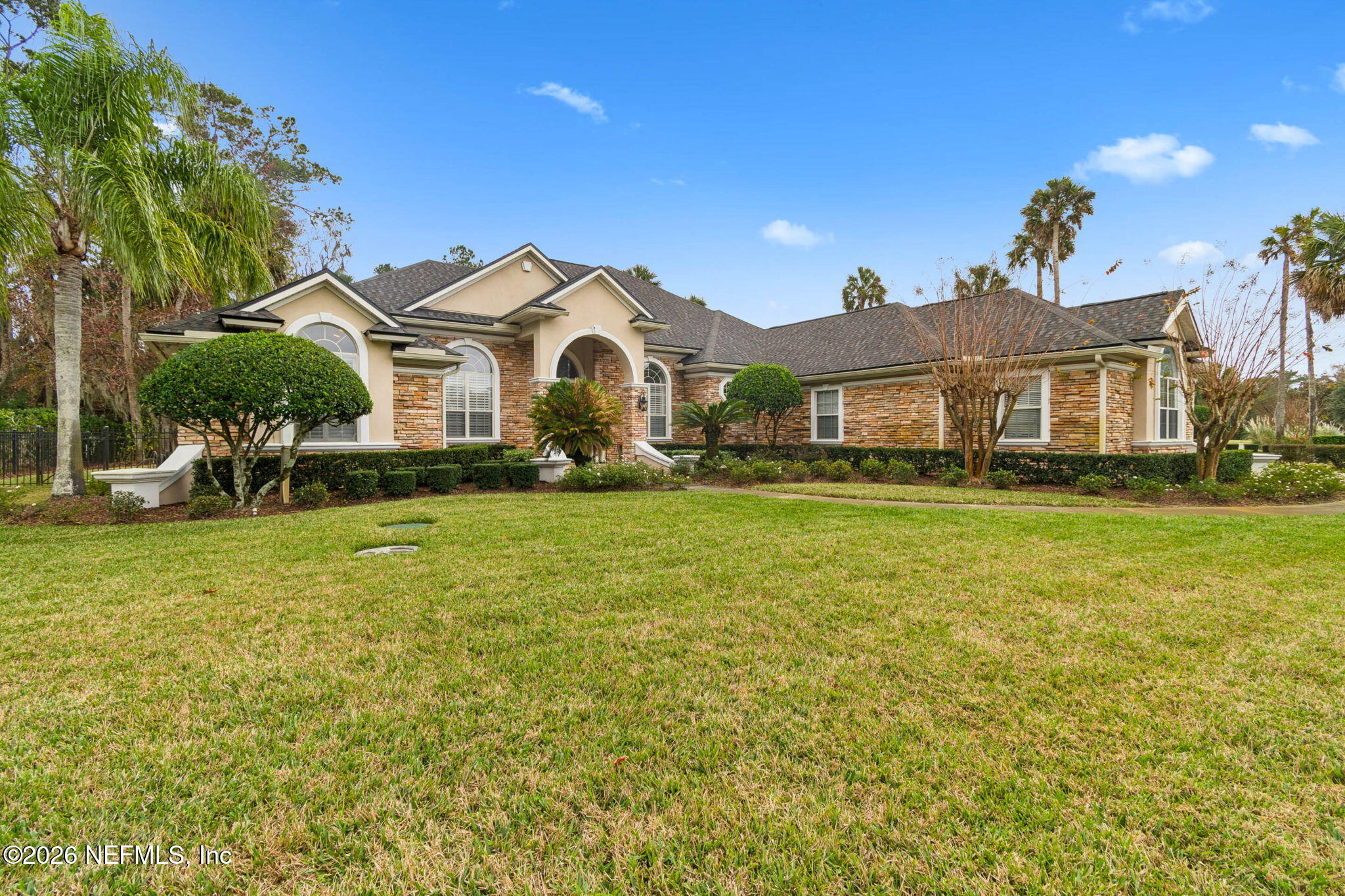 113 Natures Way Ponte Vedra Beach, FL 32082 - Photo 7 of 96 a front view of a house with a yard