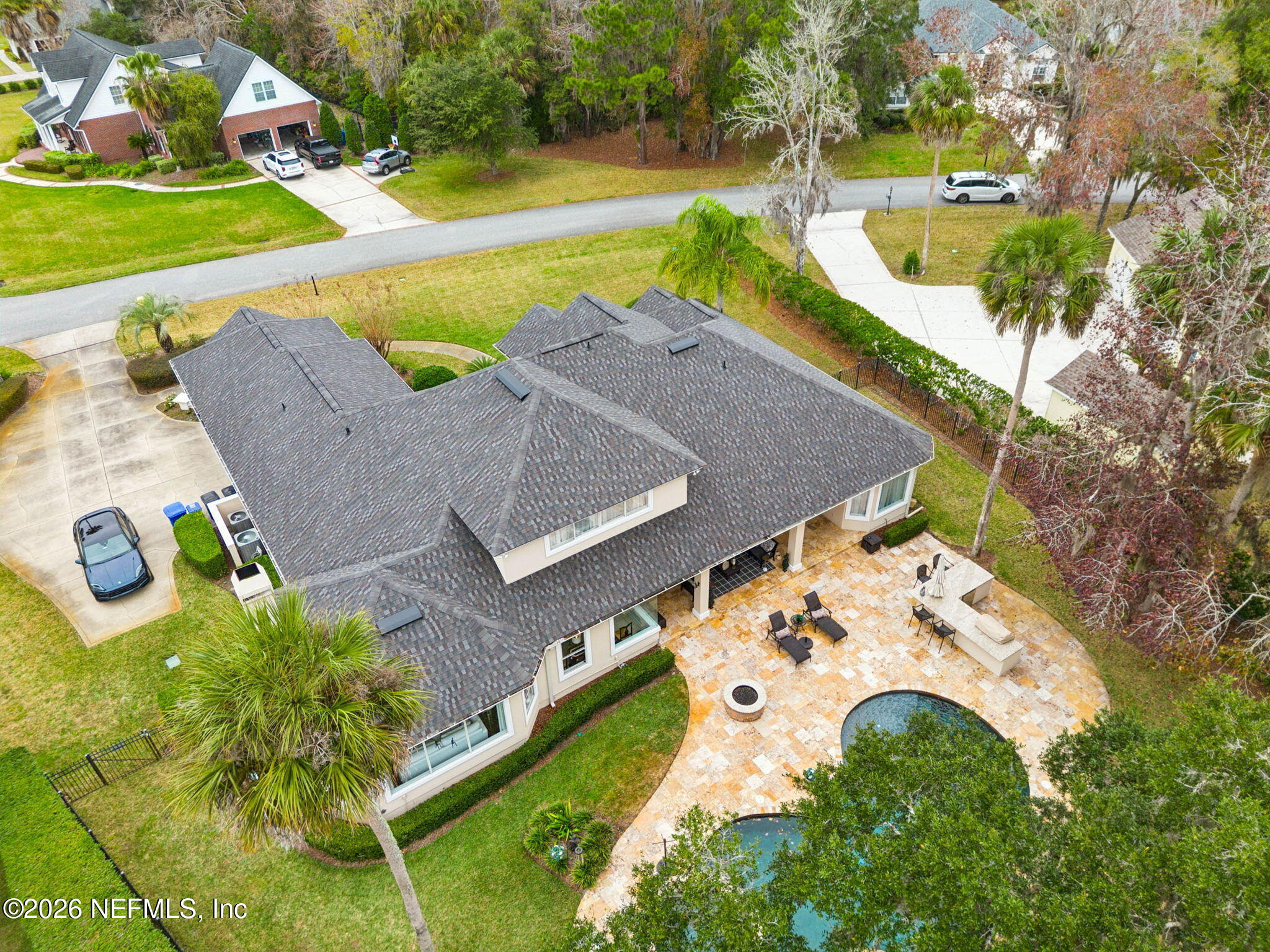 113 Natures Way Ponte Vedra Beach, FL 32082 - Photo 92 of 96 a view of a swimming pool with a yard
