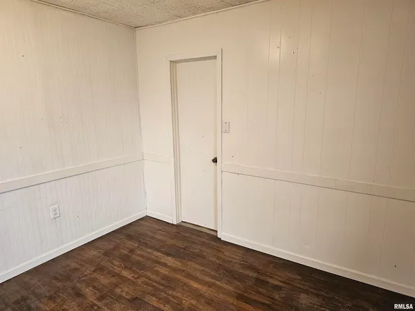 a view of small space with wooden floor